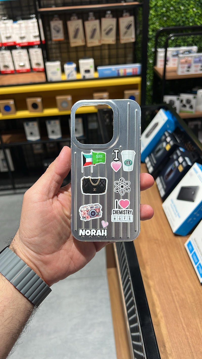 Noufa Silver Phone Case - كفر مع ستيكرز طباعة من اختياركم - الكفر + التصميم + البروفة + الطباعة - سيتم التواصل معكم لتحديد الكلمات والصور