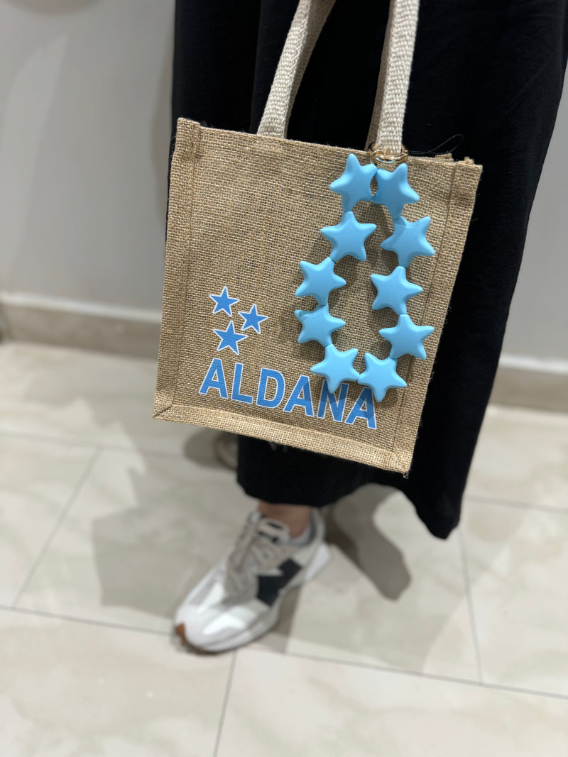 Noufa Tote bag + Stars Strap - حقيبة بتصميم خاص مع صور وعبارات من اختياركم حسب الرغبة + ستراب نجوم - سيتم التواصل معاكم لإرسال الصور