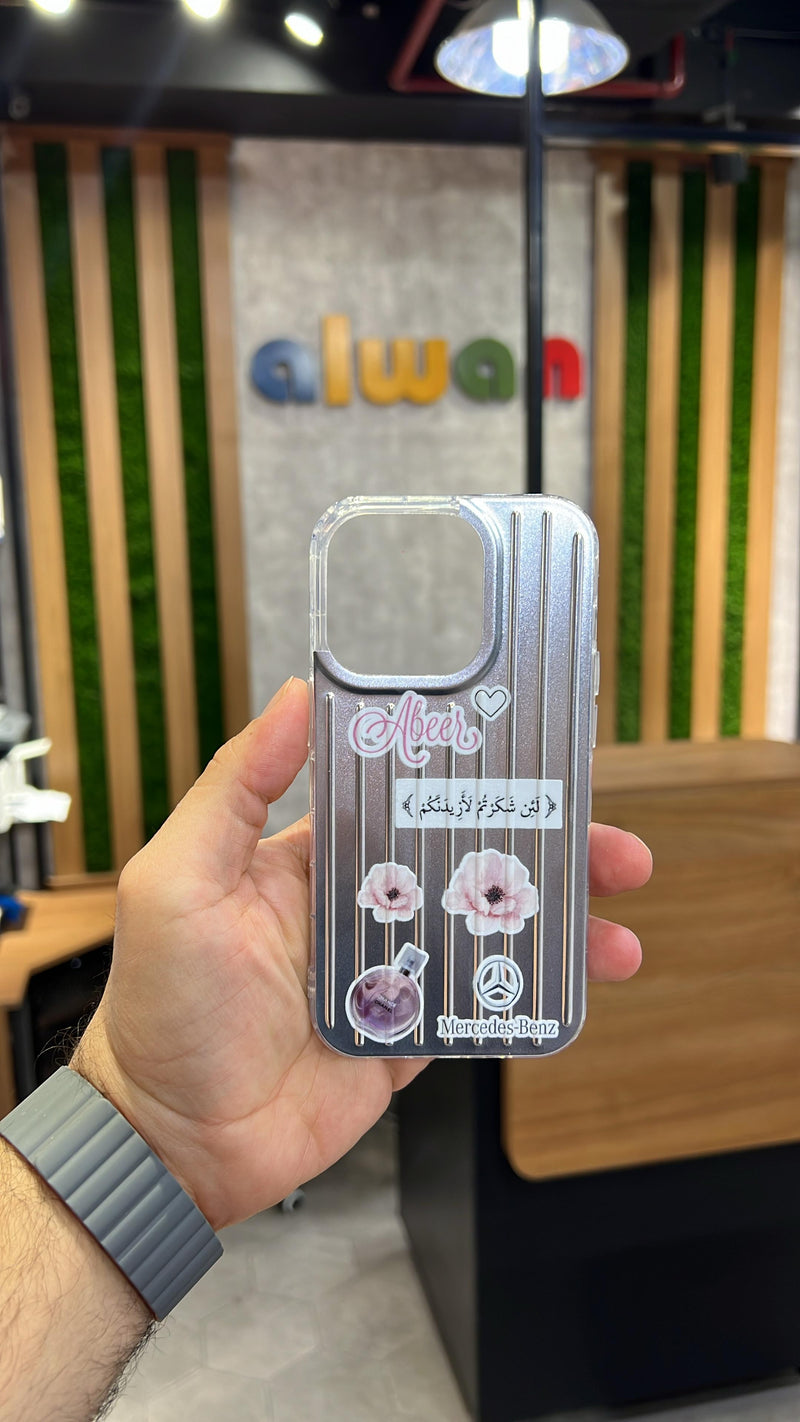 Noufa Silver Phone Case - كفر مع ستيكرز طباعة من اختياركم - الكفر + التصميم + البروفة + الطباعة - سيتم التواصل معكم لتحديد الكلمات والصور