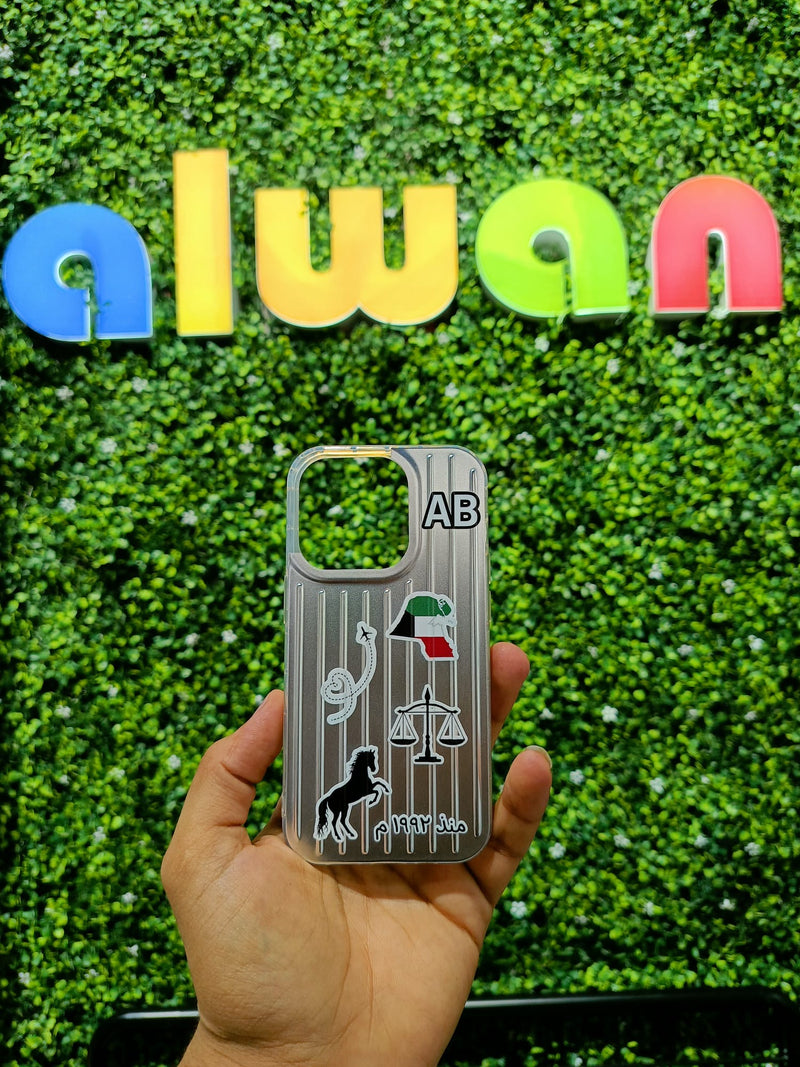 Noufa Silver Phone Case - كفر مع ستيكرز طباعة من اختياركم - الكفر + التصميم + البروفة + الطباعة - سيتم التواصل معكم لتحديد الكلمات والصور