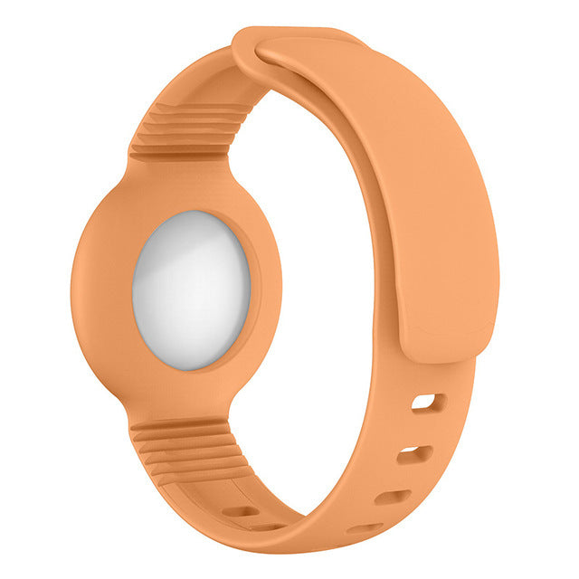 AirTag Kids Bracelet Silicone Straps Metal Stud Shock Resistant Wristband - Light Orange - سير ابل ايرتاغ