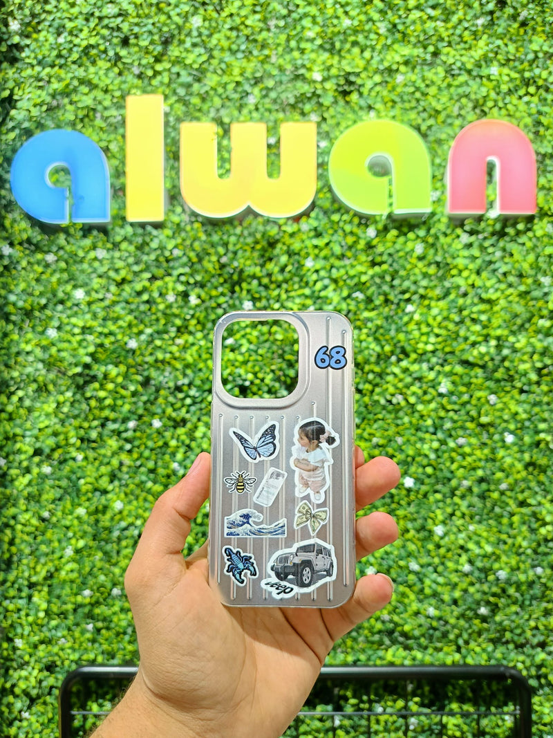 Noufa Silver Phone Case - كفر مع ستيكرز طباعة من اختياركم - الكفر + التصميم + البروفة + الطباعة - سيتم التواصل معكم لتحديد الكلمات والصور