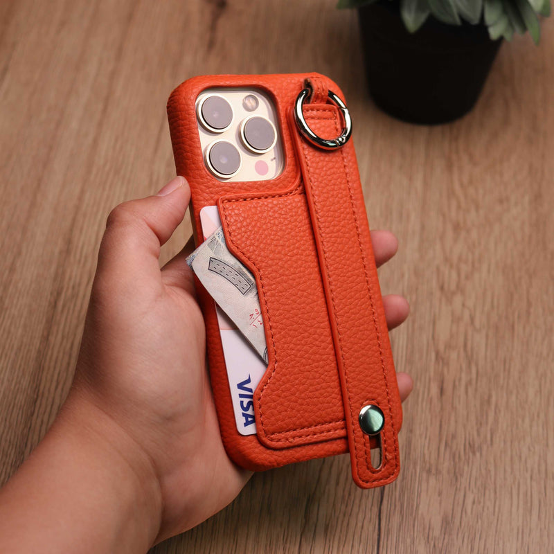 Leather Case with Card Slot and Wrist Strap - Orange - كفر مع محفظة للبطاقات ومسكة شريطة وستاند